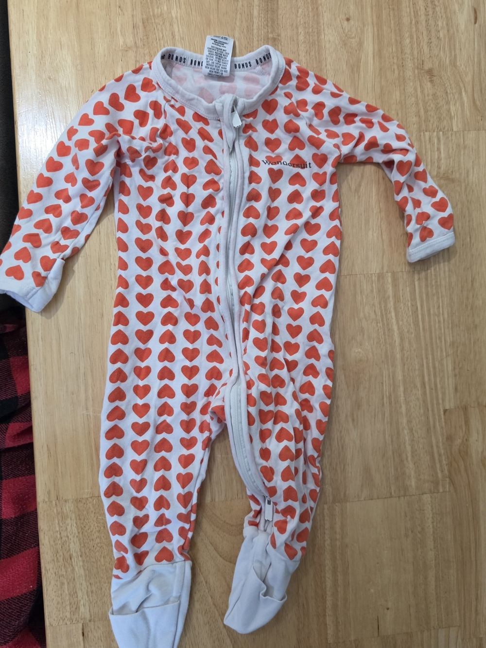 Bonds Wondersuit White Footed One-Piece with Orange Heart Print